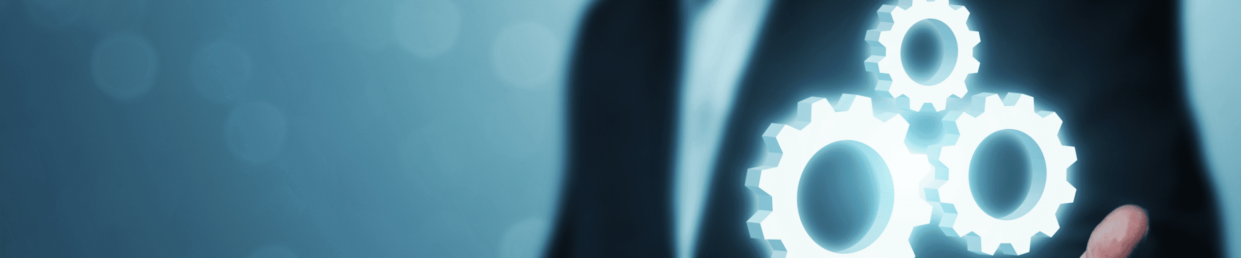 Business professional with glowing interconnected gears symbolizing automation workflows and process efficiency.